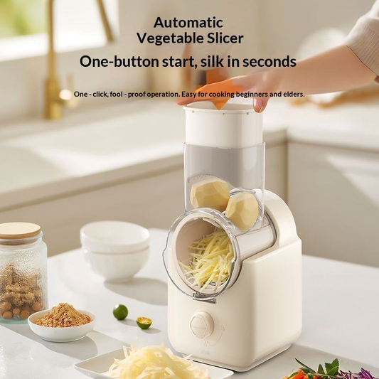 Automatic vegetable slicer with clear hopper and one-button operation, white countertop chopper.